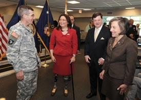 Rep. Jan Schakowsky (D-Ill.) far right and William Brandt, a Chicago Democratic activist at the Duckworth swearing in ceremony