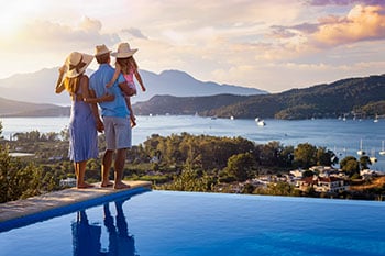 Family enjoying Greece sunset